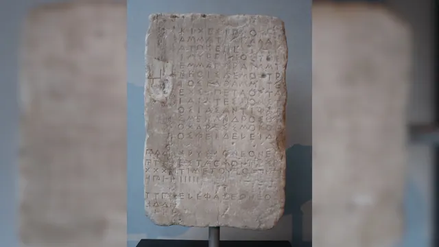 A stone inscription in an illustrative archive photograph