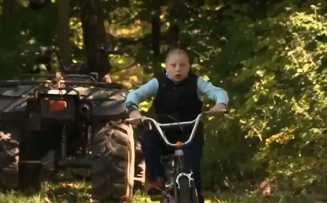 Landin riding a bicycle