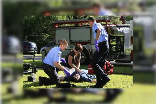 Illustrative emergency-response scene beside an ambulance
