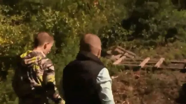 Family members outside near trees