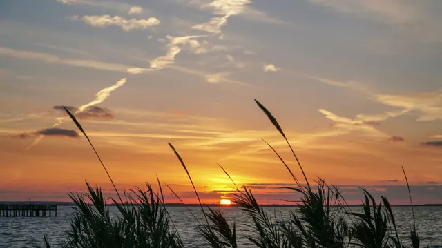 Sunset over a coastal landscape