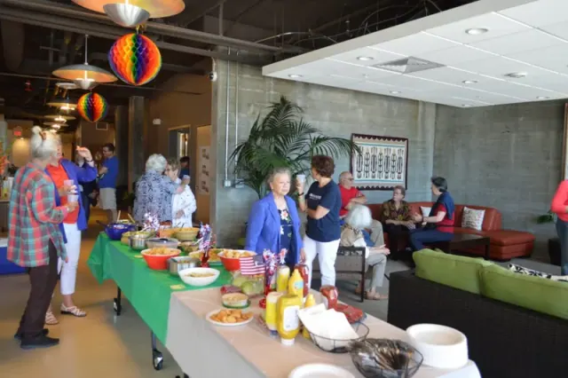 Residents gathered around a dining table