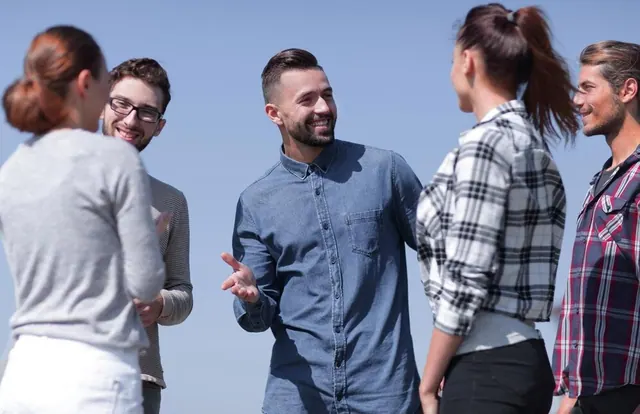 People talking outdoors, an illustrative stock photograph