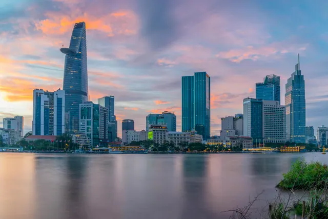 A city skyline beside water