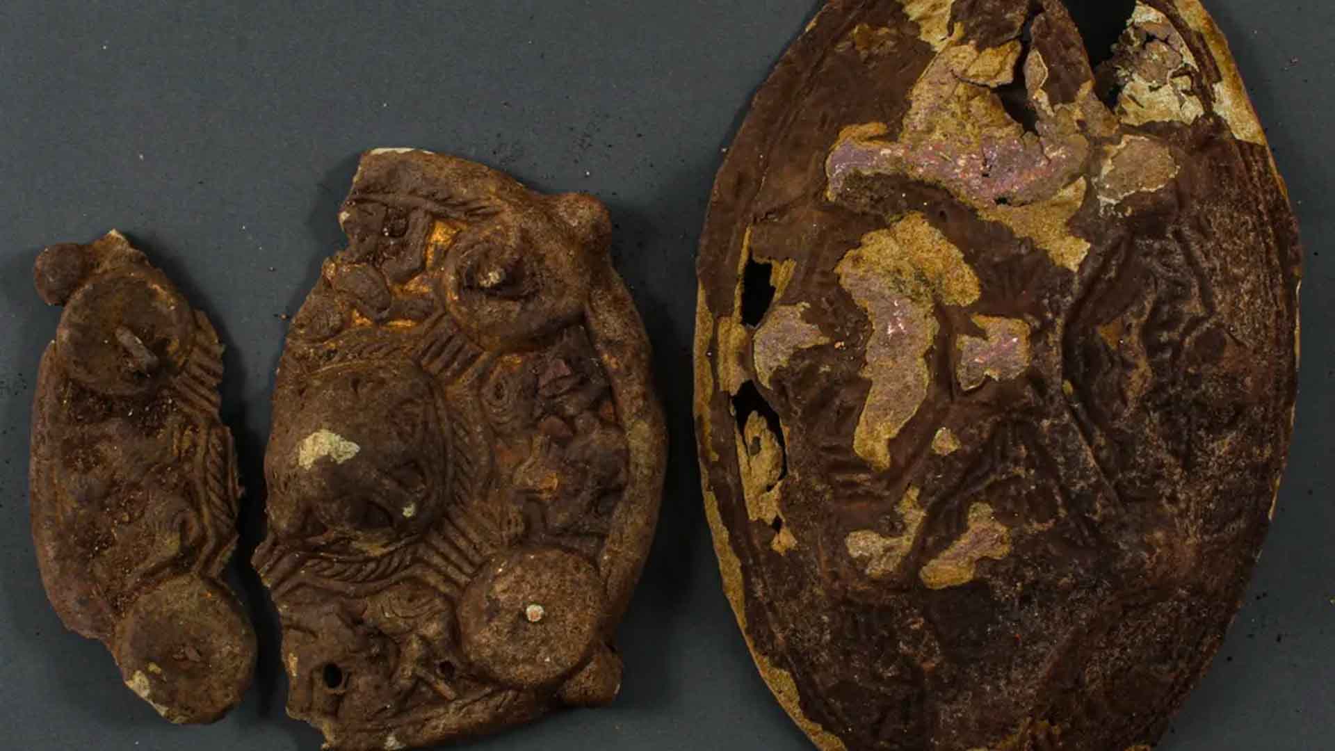 County-credited photograph showing the decorated Jomfruland finds from different angles.