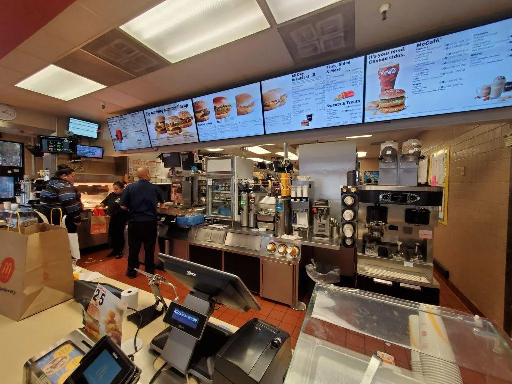 Photograph of the inside of a clean McDonald’s kitchen