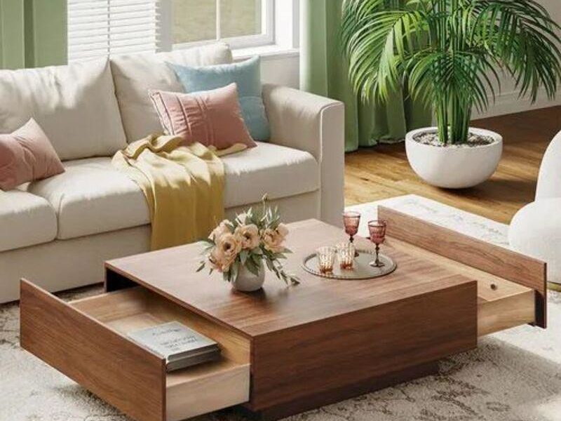 A coffee table in front of a pale sofa.