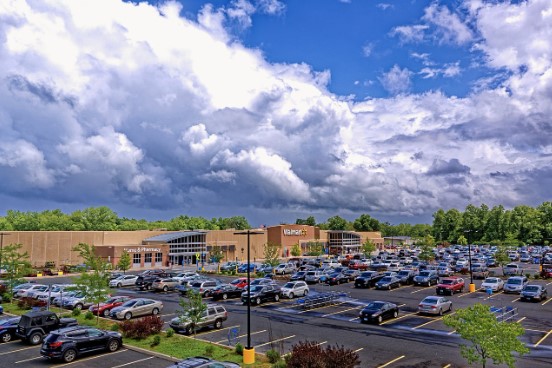 A Walmart store and parking area in an illustrative photograph