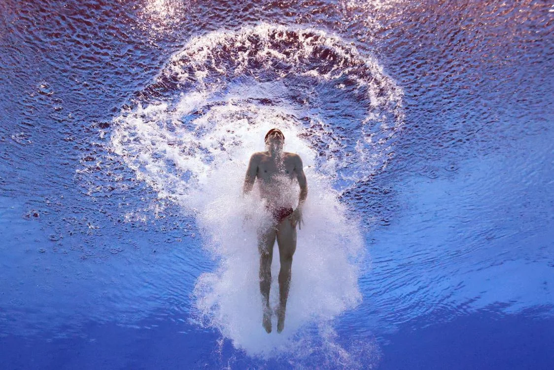 Image taken of a man swimming in the sea using an underwater camera
