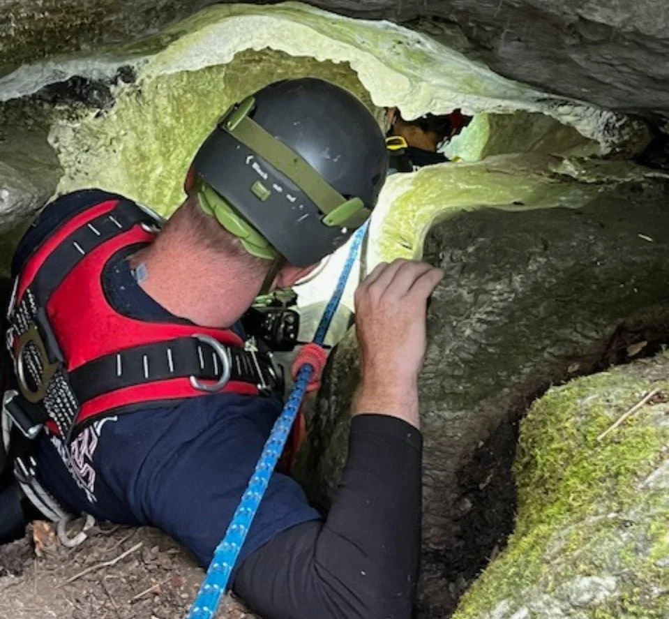 Firefighter repels down 40 feet into a cave to save a stranded dog